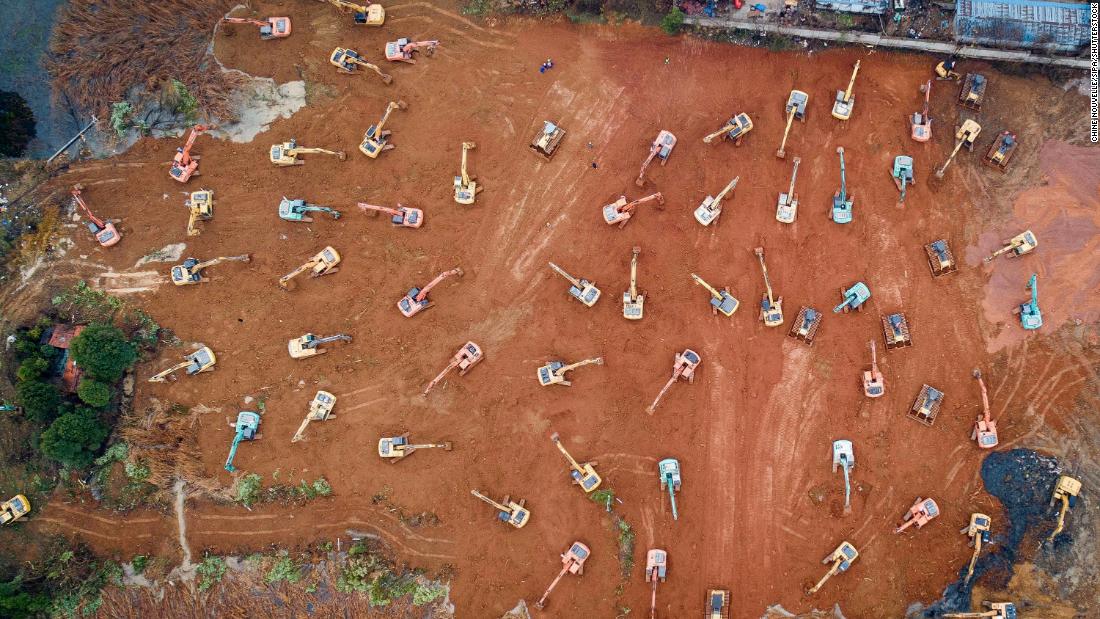 Construction workers in Wuhan begin to work on a special hospital to deal with the outbreak on January 24.